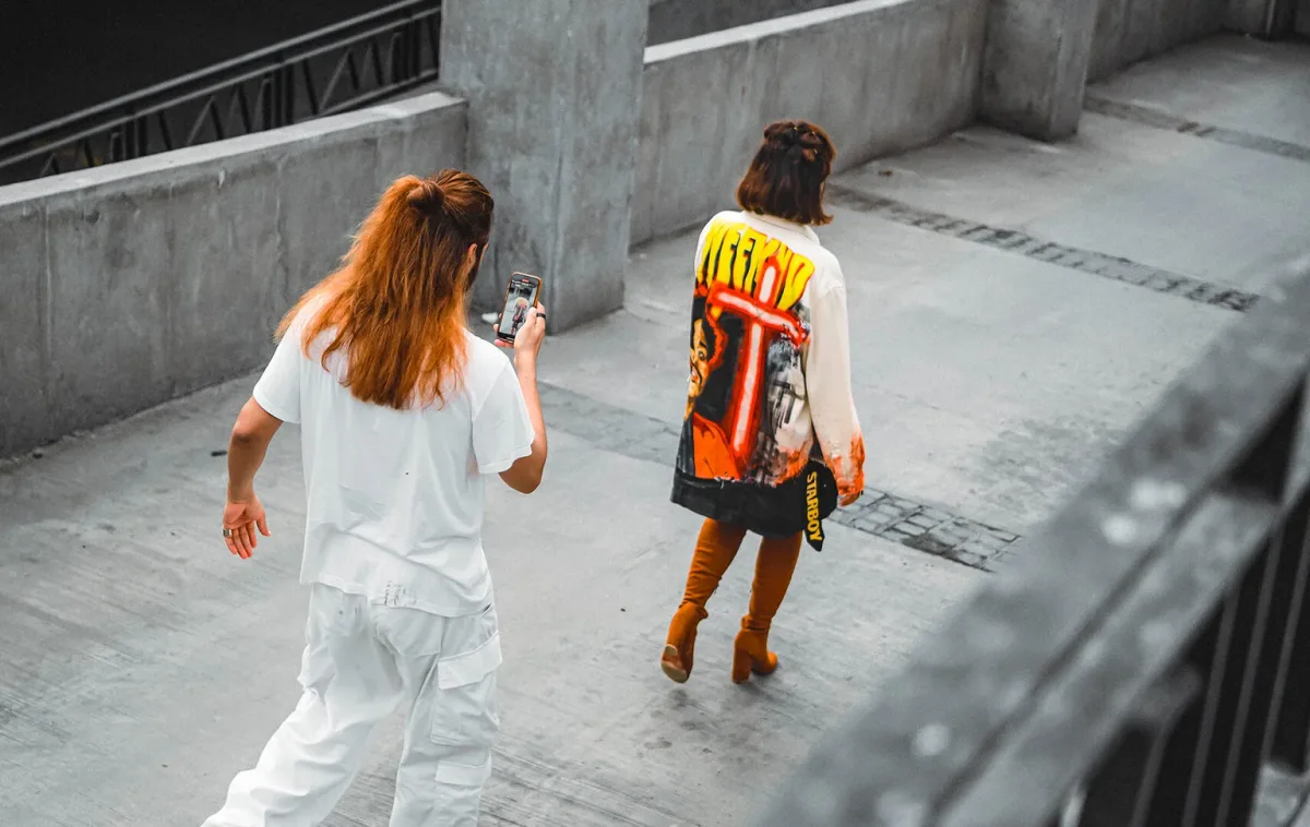OCD’s campaign photography showing custom painted clothing in an urban setting